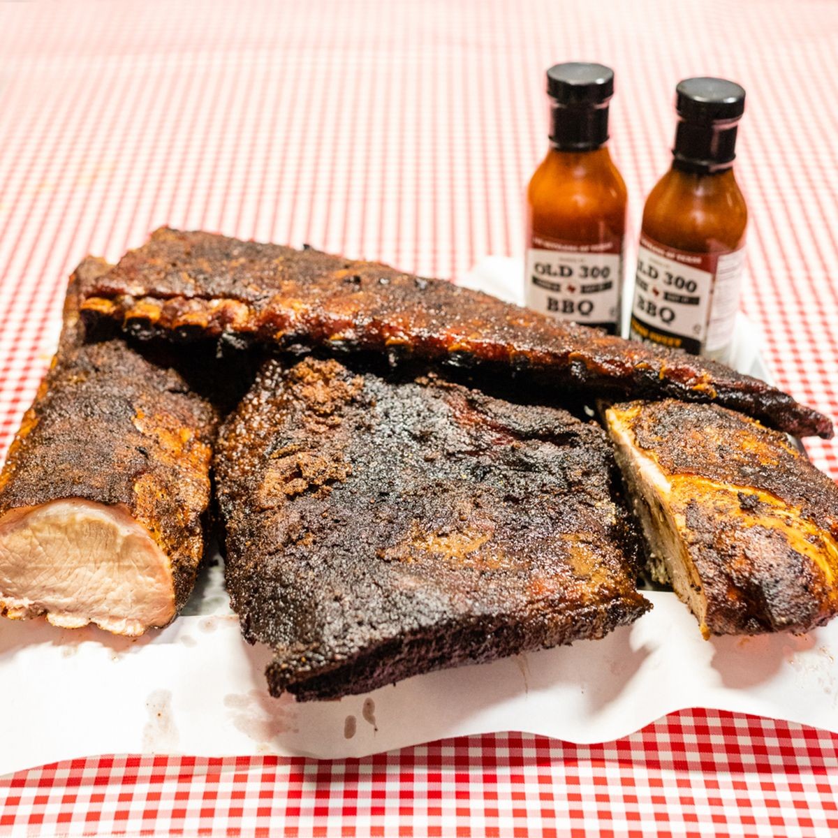 Angus trisket, ribs, pork loin and turkey, with sweet and spicy sauces from Old 300 BBQ